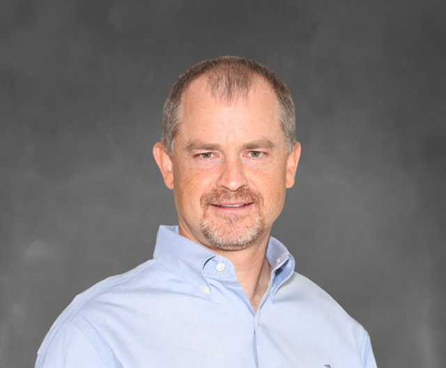 Headshot of Russell Thomas