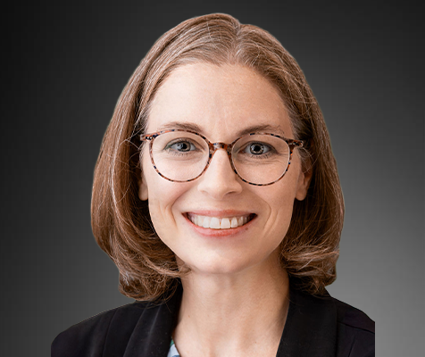 Emily Hardan, Ph.D. poses for her professional headshot.