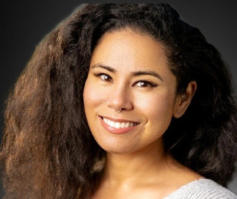 Millisa Jackson, graphic designer, poses for her professional headshot.
