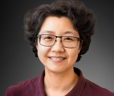 Qian Zhang, Ph.D., research scientist, poses for her professional headshot.