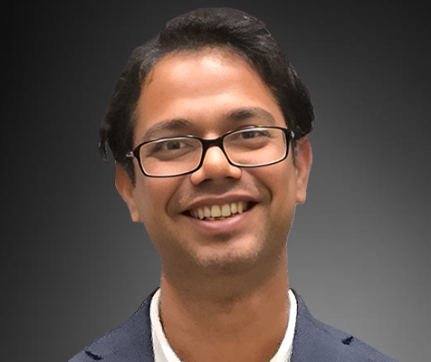 Shailgram Sharma, Ph.D., research scientist, poses for his professional headshot.