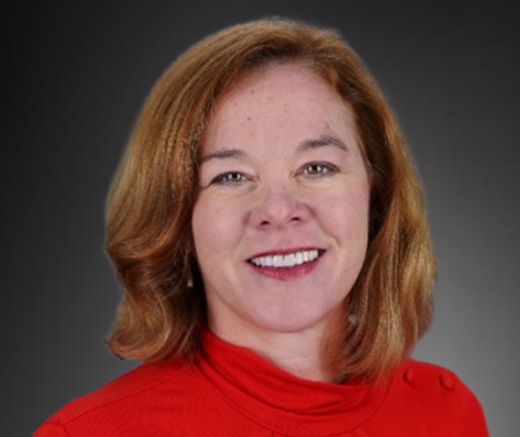 Becky Kellogg, social media specialist, poses for her professional headshot.