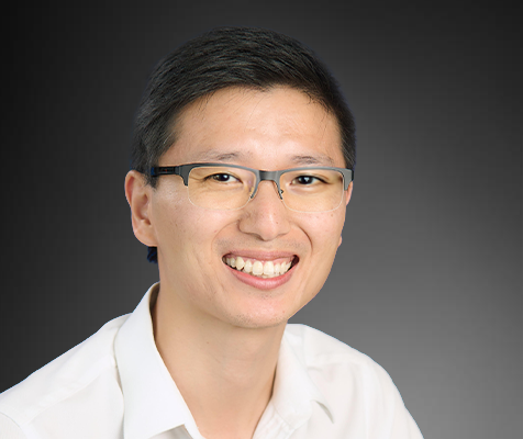 Xiaojia He, research scientist, poses for his professional picture.