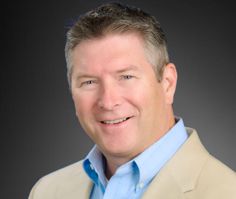 Bert Kelly, M.A., director of communications, poses for his professional headshot.