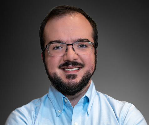 Gabriel Sinclar, M.S., cheminformatics research scientist, poses for his professional headshot.