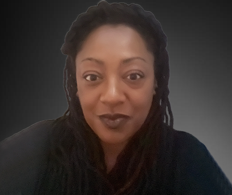 Jamilah Simon, administrative assistant, poses for a professional photo.