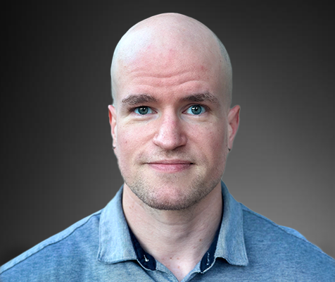 Sean Watford, MSPH, Ph.D., chemical safety data science manager, poses for his professional headshot.