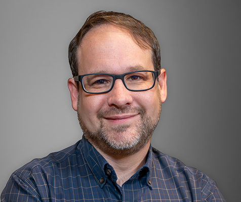 Andy Shapiro, MSPH, senior software engineer, poses for his professional headshot.