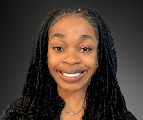 Imani Gulley, administrative assistant, poses for her professional photograph.