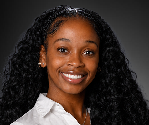 Imani Gulley, administrative assistant, poses for her professional headshot.