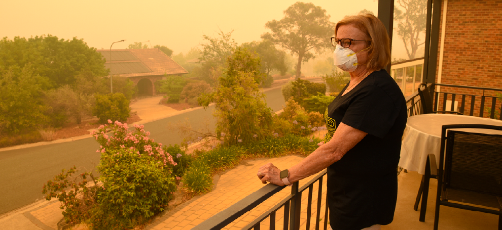 Canberra, Australia, 5/01/2020, Smoke coming from nearby forest fires creates high pollution and covers Canberra with a thick fog. People need to wear mask to breathe.