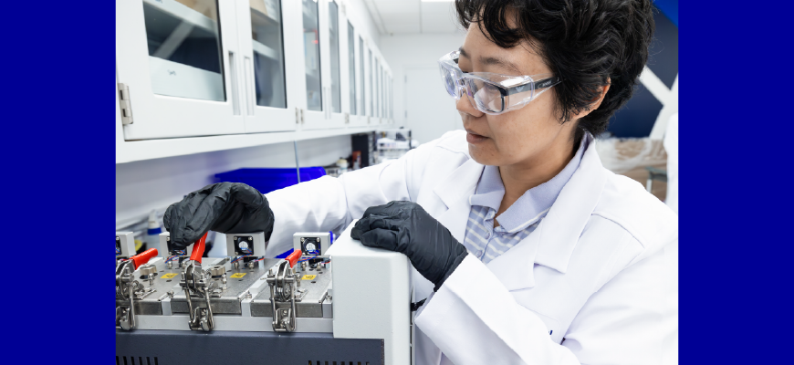 Qian Zhang, Ph.D. closes a micro chamber.